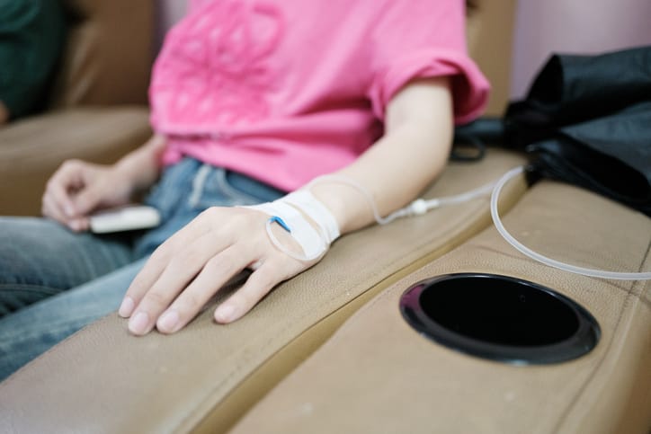 Woman with intravenous injection